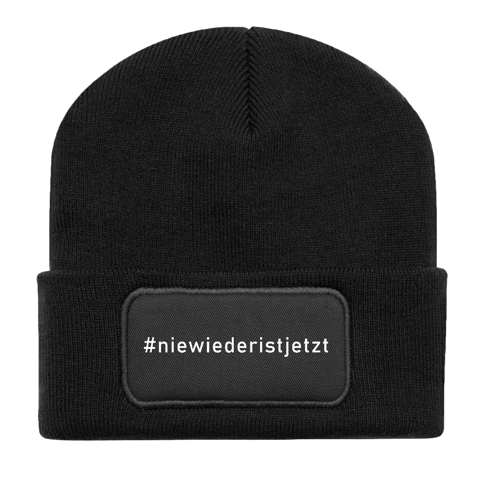 Schwarze Aktivismus-Mütze mit #niewiederistjetzt Stickerei


