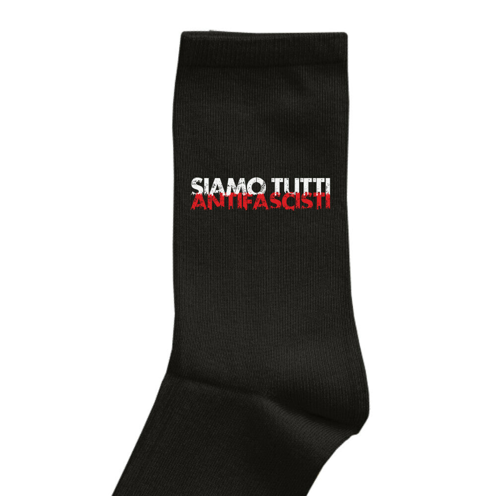Schwarze Socke mit gesticktem Schriftzug ‚SIAMO TUTTI ANTIFASCISTI‘ 